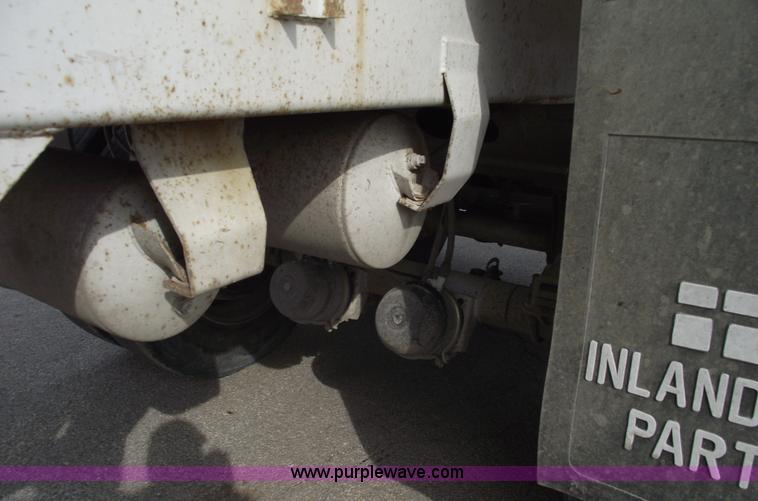 image for item C5704 1999 Clement 26' barrel end dump trailer