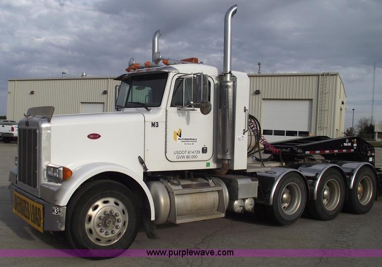 image for item C5708 1997 Peterbilt 378 triple axle semi truck