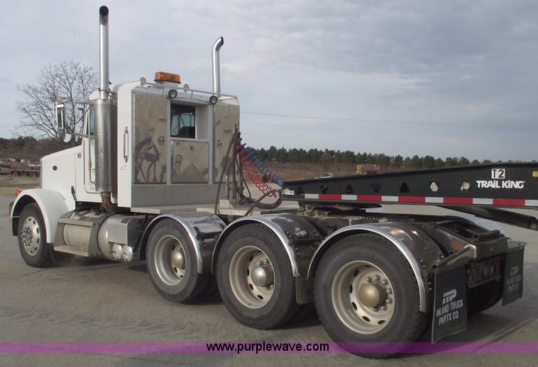 image for item C5708 1997 Peterbilt 378 triple axle semi truck