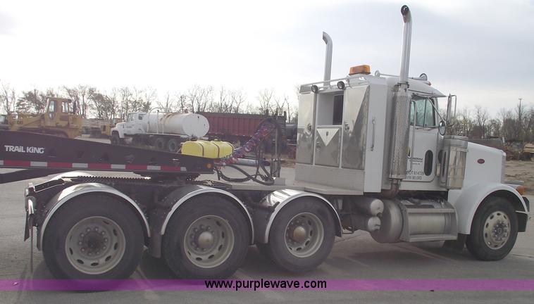 image for item C5708 1997 Peterbilt 378 triple axle semi truck