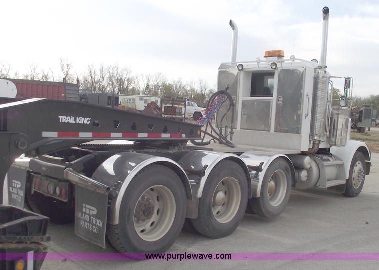 image for item C5708 1997 Peterbilt 378 triple axle semi truck
