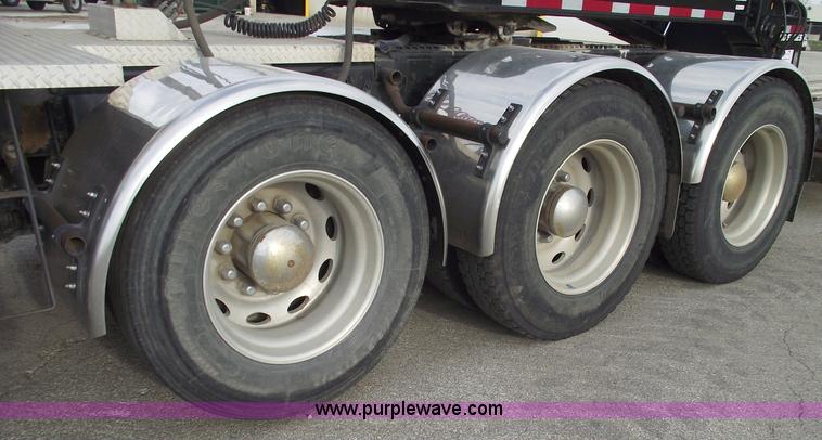 image for item C5708 1997 Peterbilt 378 triple axle semi truck