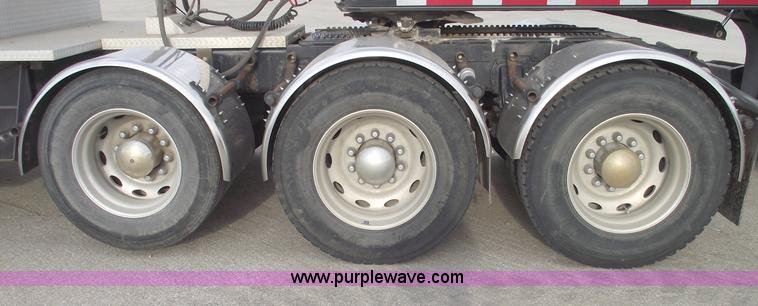 image for item C5708 1997 Peterbilt 378 triple axle semi truck