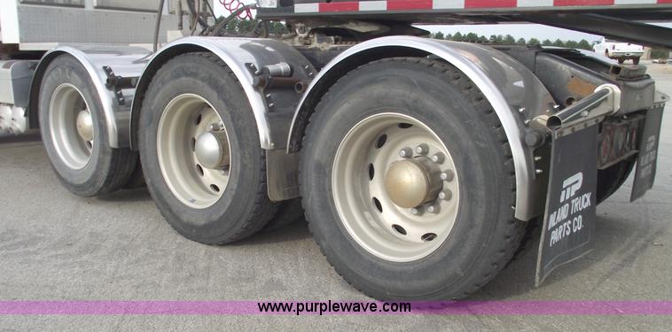 image for item C5708 1997 Peterbilt 378 triple axle semi truck