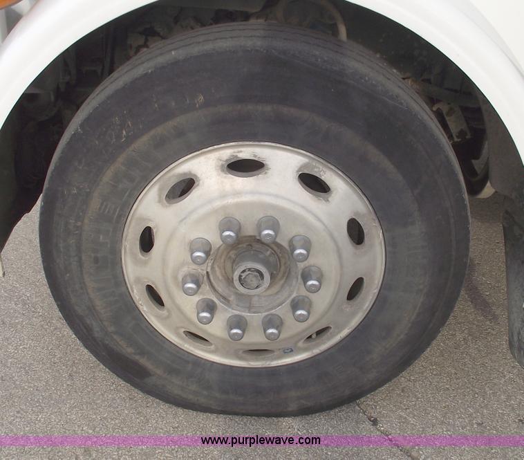 image for item C5708 1997 Peterbilt 378 triple axle semi truck