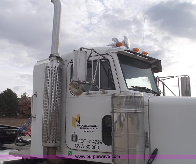 image for item C5708 1997 Peterbilt 378 triple axle semi truck