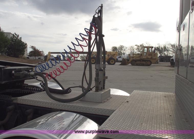 image for item C5708 1997 Peterbilt 378 triple axle semi truck