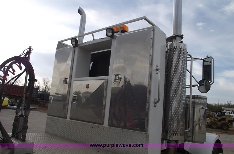 image for item C5708 1997 Peterbilt 378 triple axle semi truck