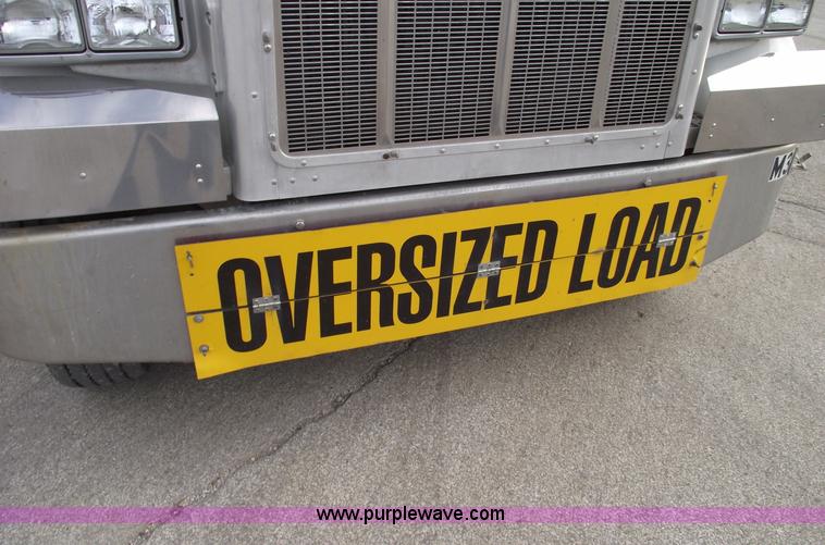 image for item C5708 1997 Peterbilt 378 triple axle semi truck