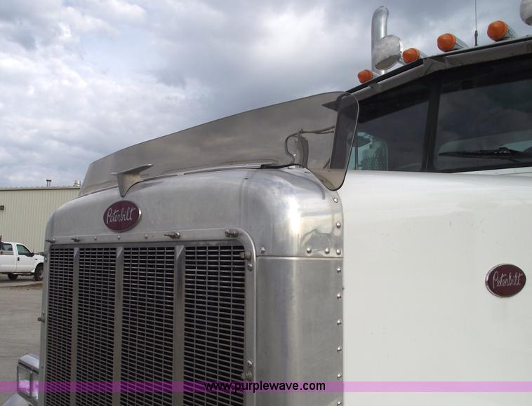 image for item C5708 1997 Peterbilt 378 triple axle semi truck