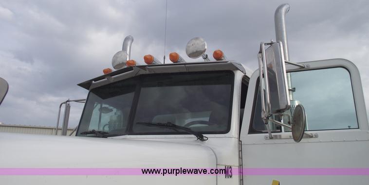 image for item C5708 1997 Peterbilt 378 triple axle semi truck