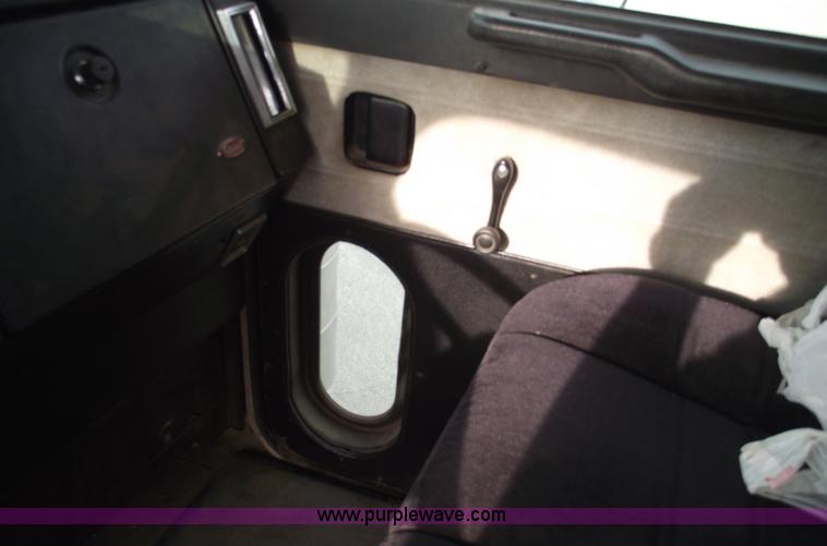 image for item C5708 1997 Peterbilt 378 triple axle semi truck