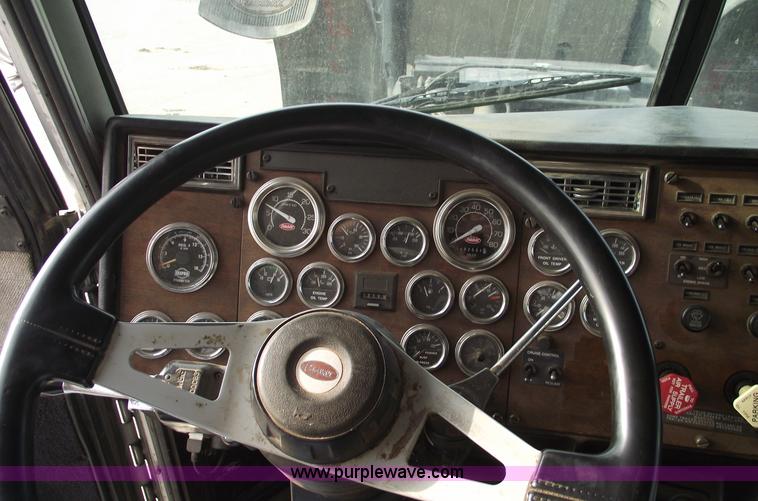 image for item C5708 1997 Peterbilt 378 triple axle semi truck