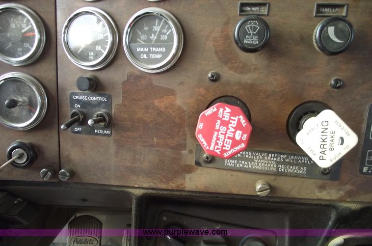 image for item C5708 1997 Peterbilt 378 triple axle semi truck