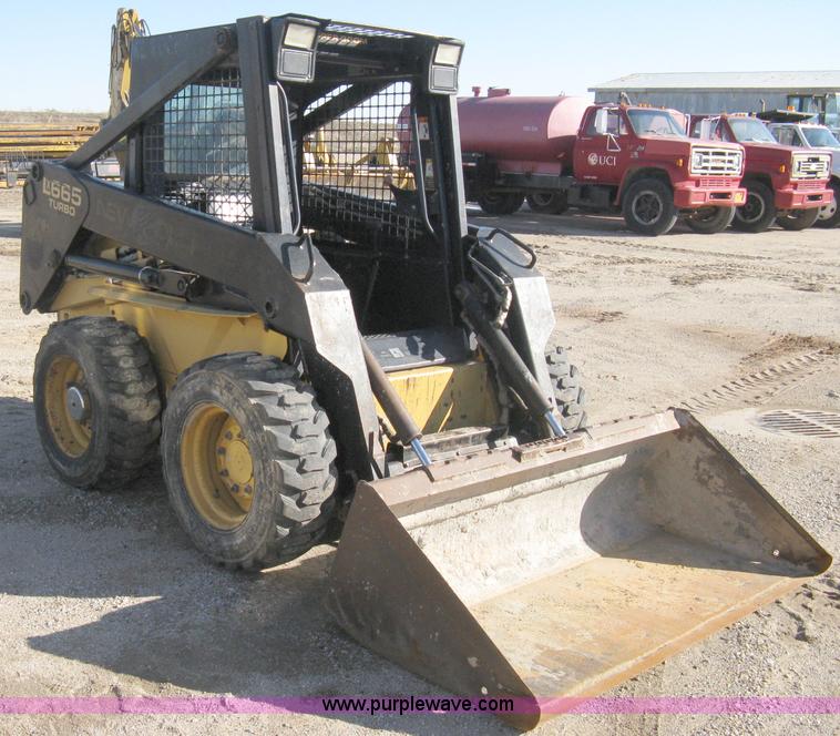 image for item A4472 1999 New Holland LX665 Turbo Super Boom skid loader