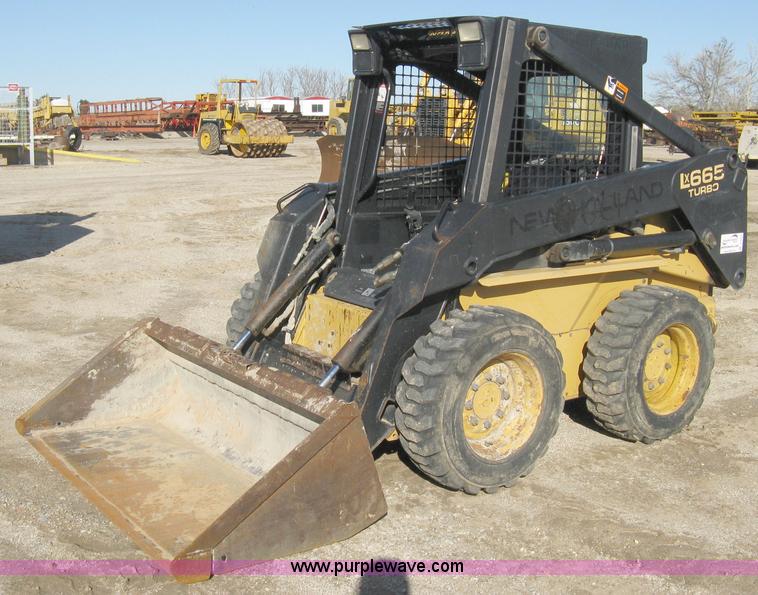 image for item A4472 1999 New Holland LX665 Turbo Super Boom skid loader