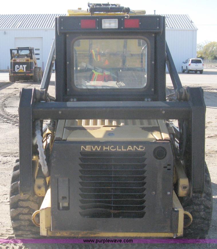 image for item A4472 1999 New Holland LX665 Turbo Super Boom skid loader