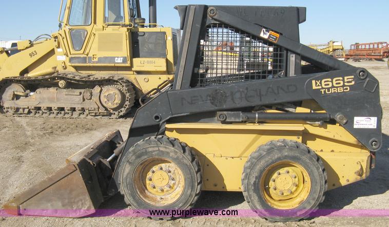 image for item A4472 1999 New Holland LX665 Turbo Super Boom skid loader