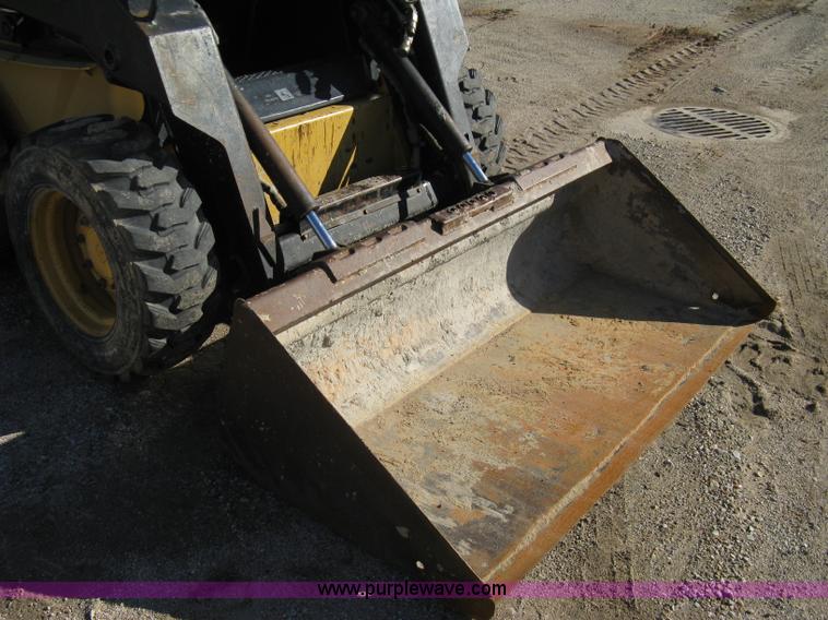 image for item A4472 1999 New Holland LX665 Turbo Super Boom skid loader