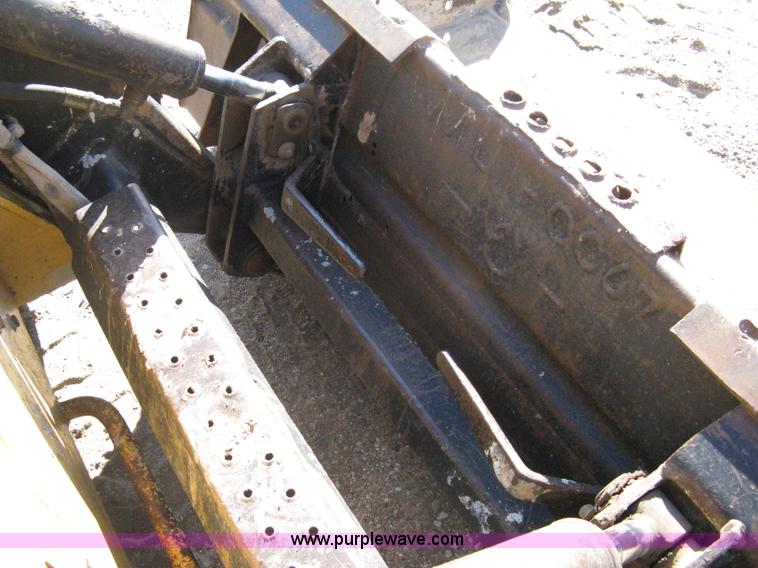 image for item A4472 1999 New Holland LX665 Turbo Super Boom skid loader