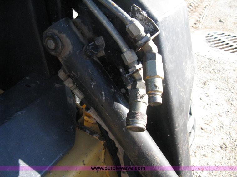 image for item A4472 1999 New Holland LX665 Turbo Super Boom skid loader