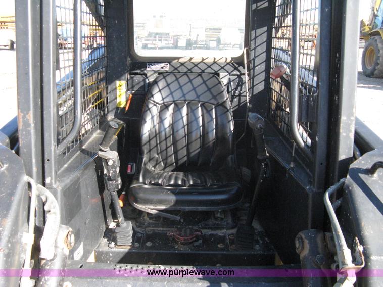 image for item A4472 1999 New Holland LX665 Turbo Super Boom skid loader