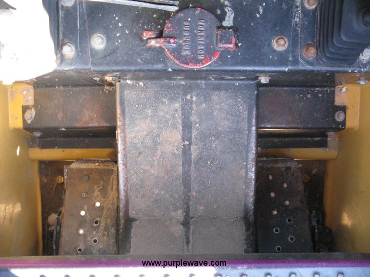 image for item A4472 1999 New Holland LX665 Turbo Super Boom skid loader