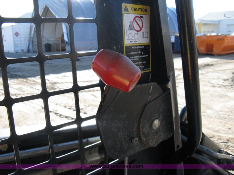 image for item A4472 1999 New Holland LX665 Turbo Super Boom skid loader