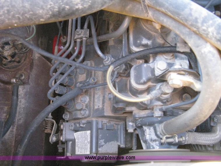 image for item A4472 1999 New Holland LX665 Turbo Super Boom skid loader