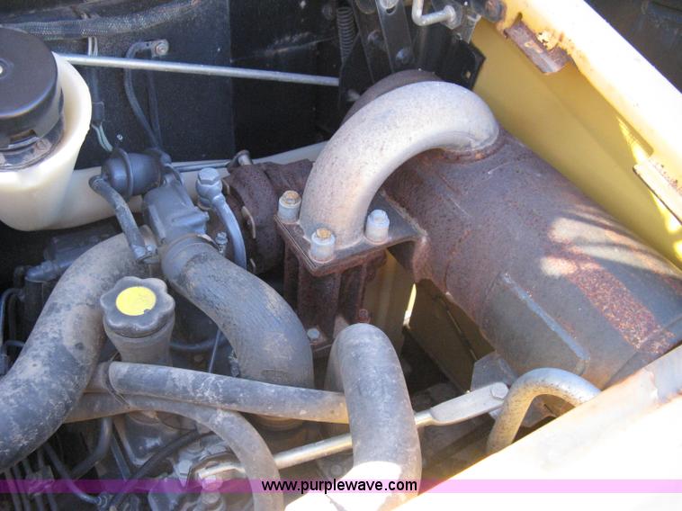 image for item A4472 1999 New Holland LX665 Turbo Super Boom skid loader