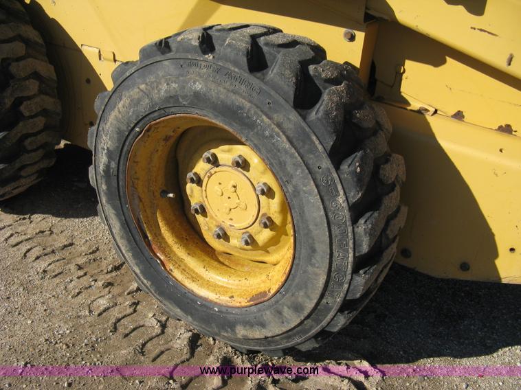 image for item A4472 1999 New Holland LX665 Turbo Super Boom skid loader