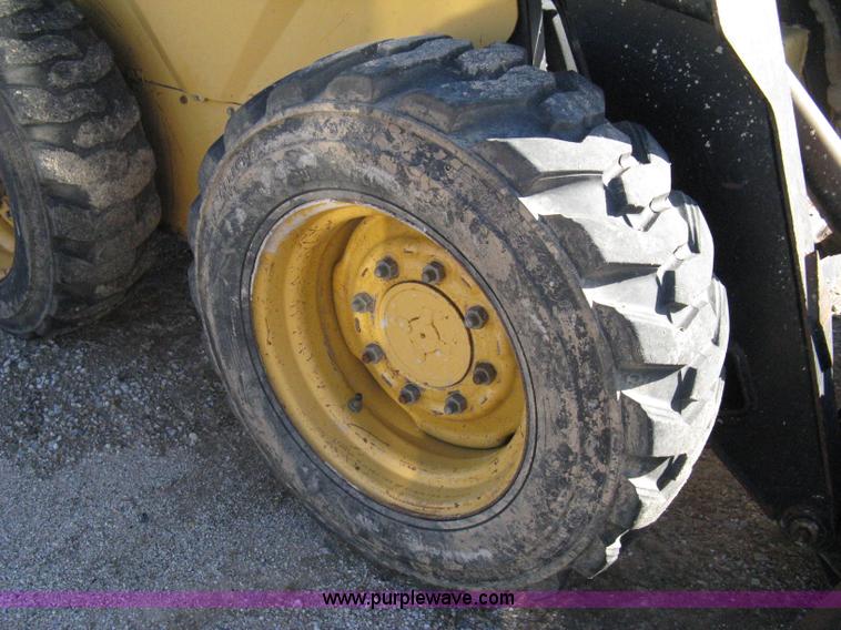 image for item A4472 1999 New Holland LX665 Turbo Super Boom skid loader