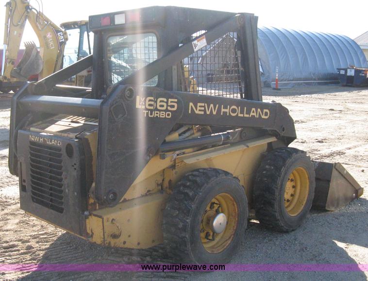 image for item A4473 1999 New Holland LX665 Turbo Super Boom skid loader