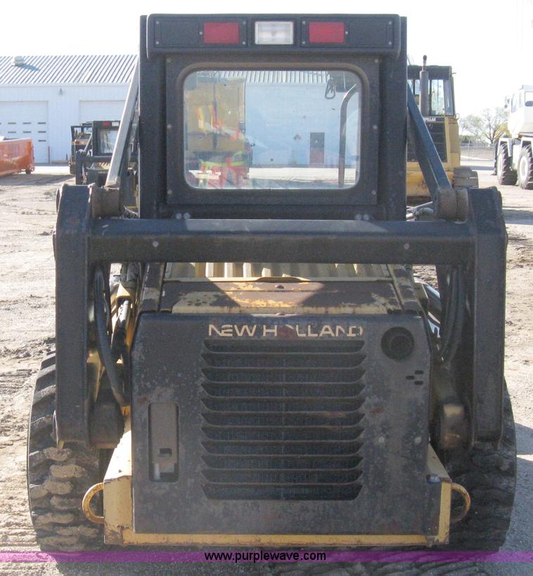 image for item A4473 1999 New Holland LX665 Turbo Super Boom skid loader
