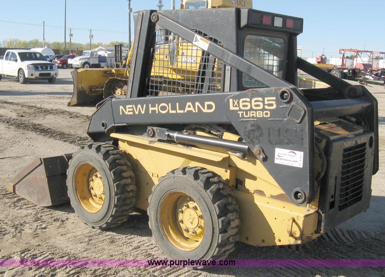 image for item A4473 1999 New Holland LX665 Turbo Super Boom skid loader