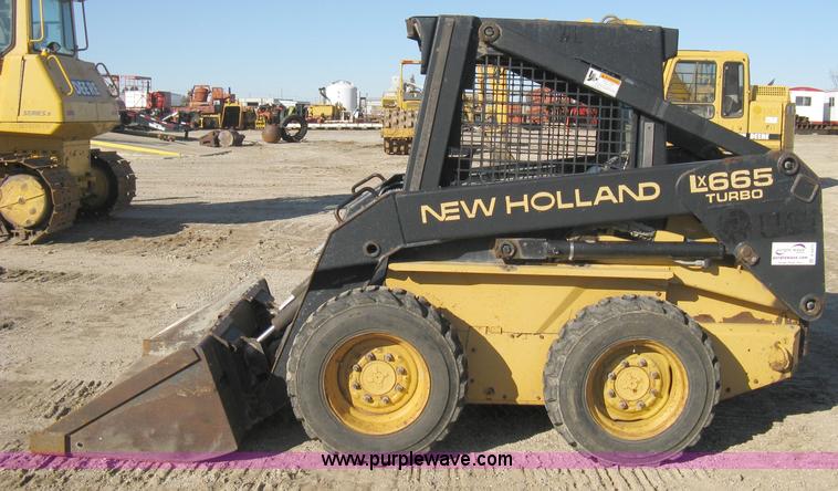 image for item A4473 1999 New Holland LX665 Turbo Super Boom skid loader