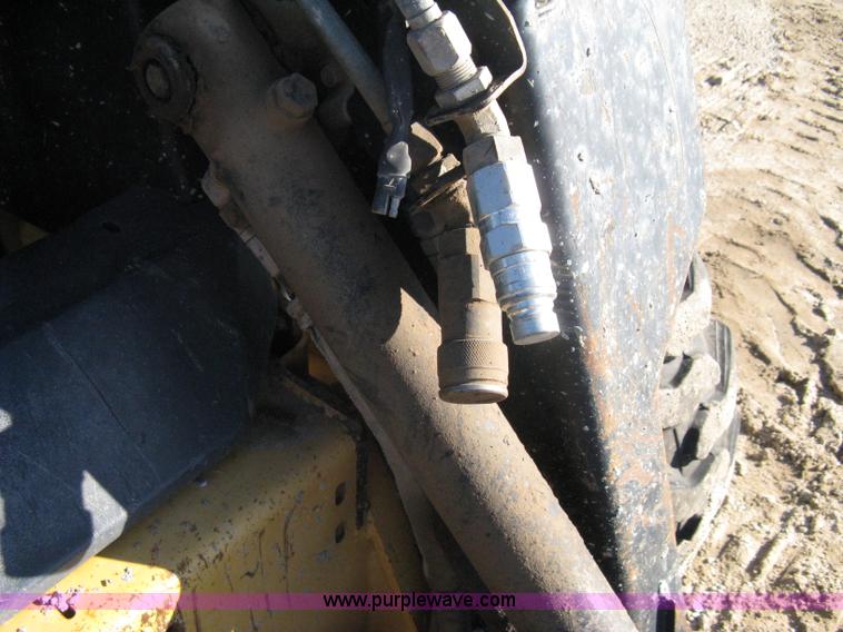 image for item A4473 1999 New Holland LX665 Turbo Super Boom skid loader