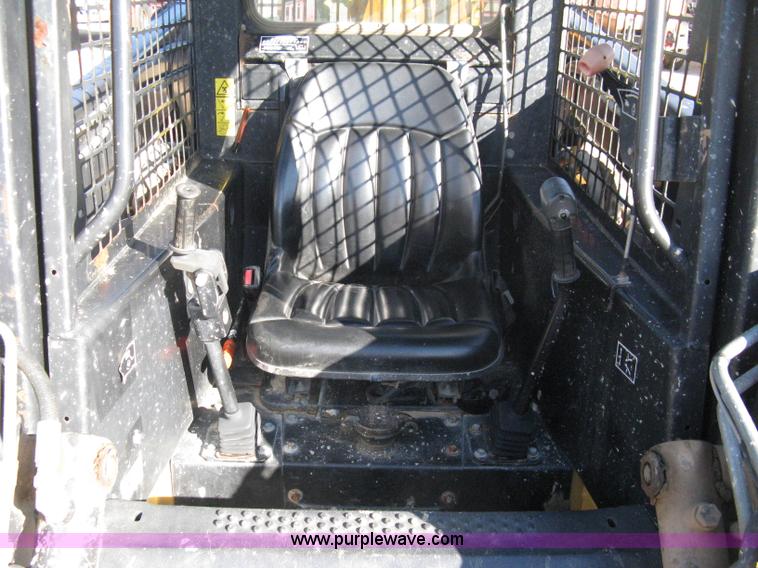 image for item A4473 1999 New Holland LX665 Turbo Super Boom skid loader