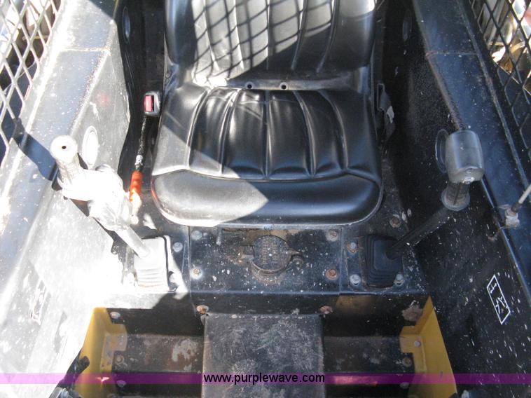 image for item A4473 1999 New Holland LX665 Turbo Super Boom skid loader