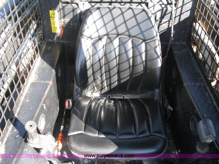 image for item A4473 1999 New Holland LX665 Turbo Super Boom skid loader