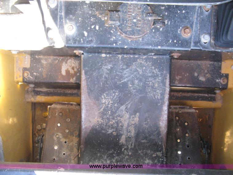 image for item A4473 1999 New Holland LX665 Turbo Super Boom skid loader