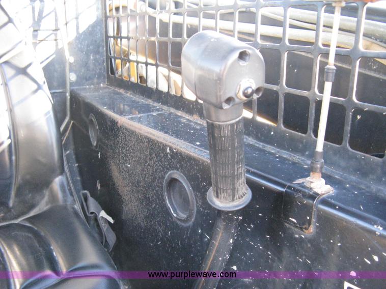 image for item A4473 1999 New Holland LX665 Turbo Super Boom skid loader