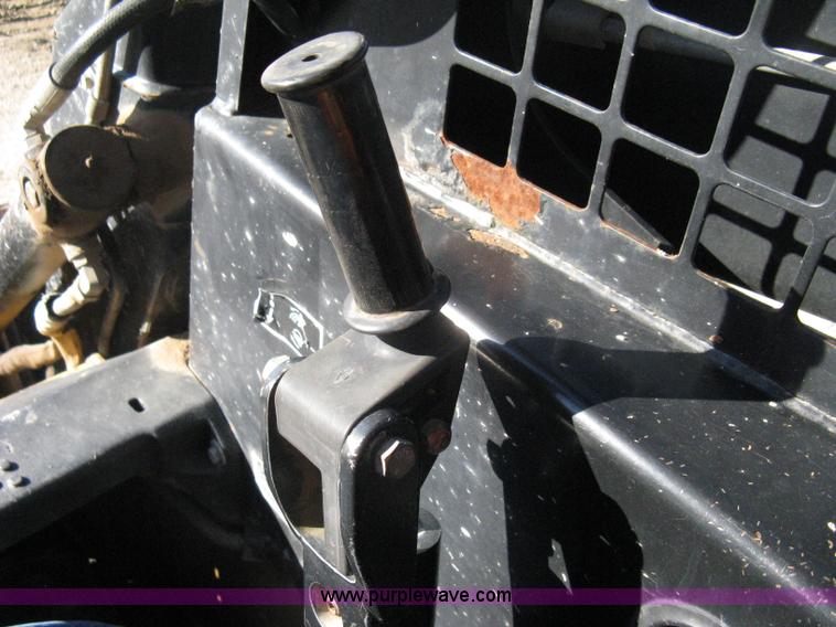 image for item A4473 1999 New Holland LX665 Turbo Super Boom skid loader