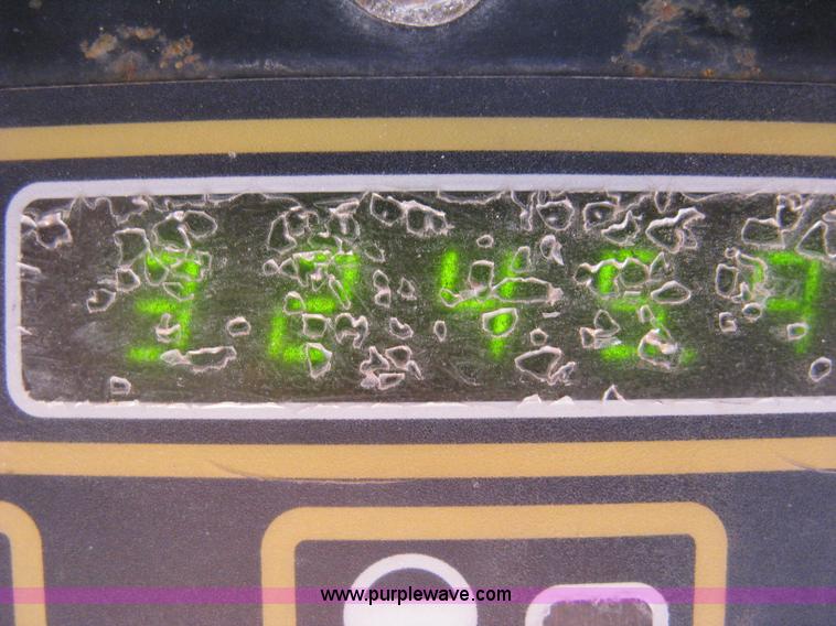 image for item A4473 1999 New Holland LX665 Turbo Super Boom skid loader