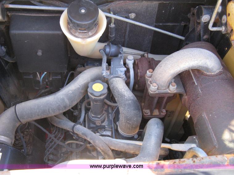 image for item A4473 1999 New Holland LX665 Turbo Super Boom skid loader