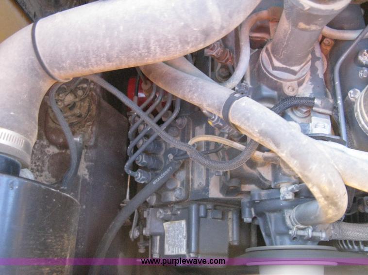 image for item A4473 1999 New Holland LX665 Turbo Super Boom skid loader