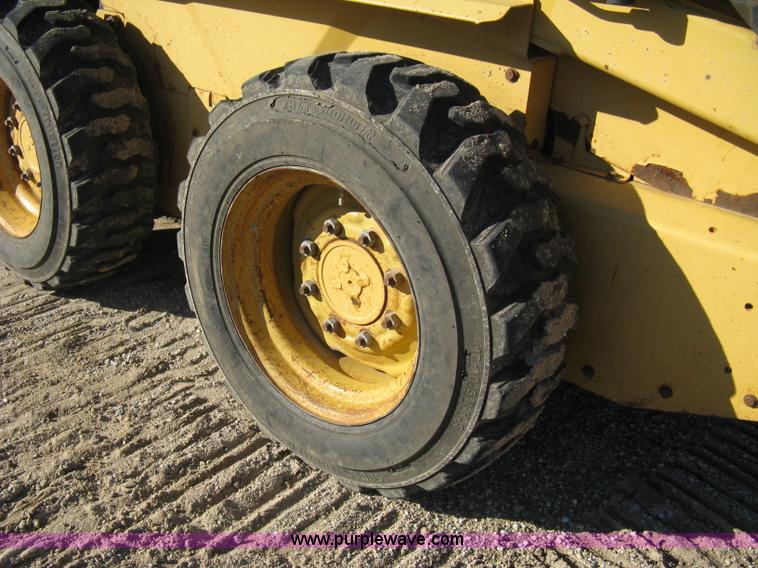 image for item A4473 1999 New Holland LX665 Turbo Super Boom skid loader