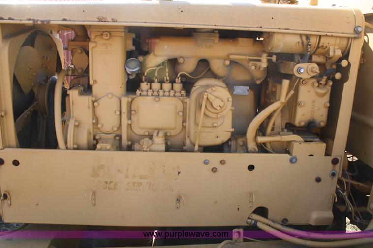 image for item A6526 Caterpillar 212 motor grader