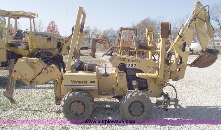image for item C5754 Vermeer V3550A vibratory plow with backhoe