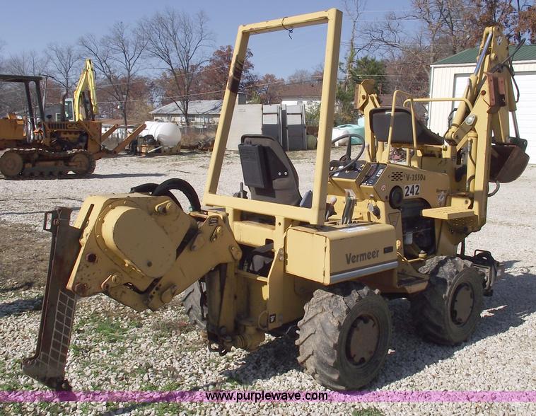image for item C5754 Vermeer V3550A vibratory plow with backhoe